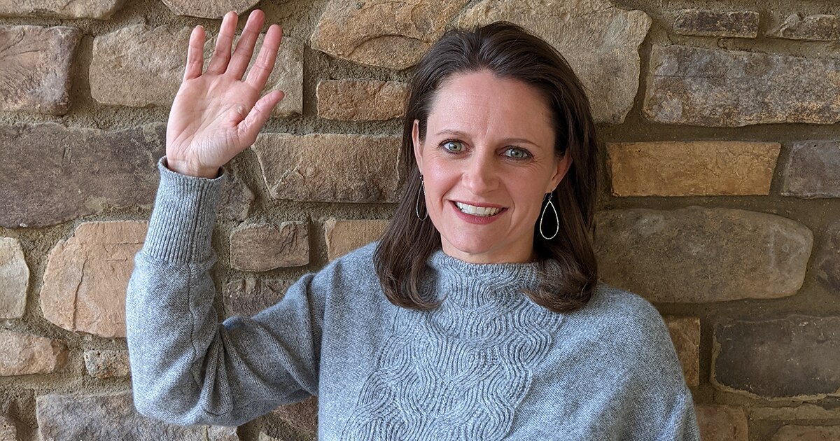Jodi F., Director of Fleet Management, raising her right hand