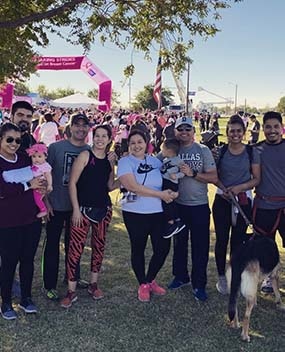 Group of employees with dog and babies