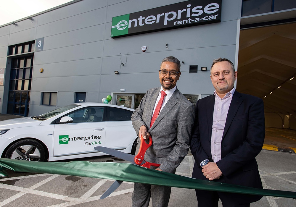 16.12.22 - Picture shows Minister for the Economy of Wales Vaughan Gething and Randall Rickabaugh at the new site opening of Enterprise rent-a-car in Cardiff, South Wales.